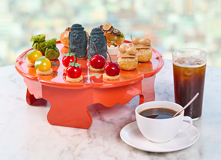 A high tea set inspired by traditional Korean table settings, capturing the essence of Korean flavor