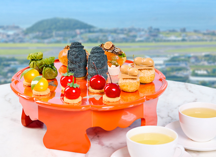 A high tea set inspired by traditional Korean table settings, capturing the essence of Korean flavor